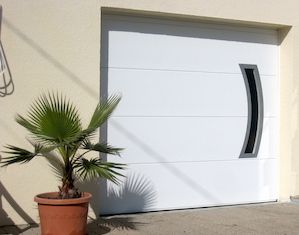 Up-and-over garage door Spadone with large porthole