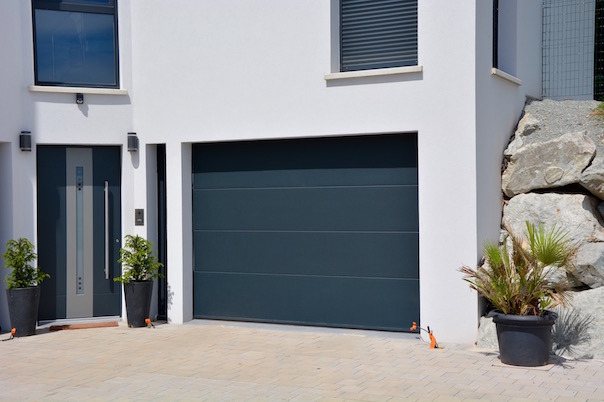 Anthracite gray sectional garage door with smooth slats without grooves